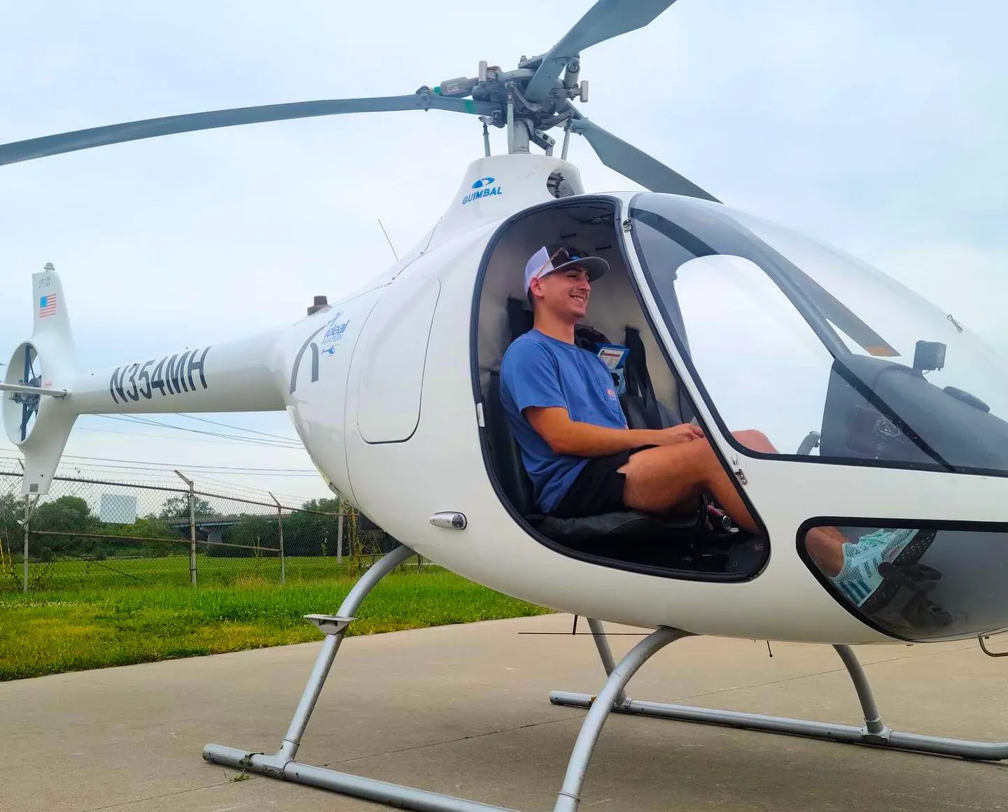 Helicopter with smiling pilot