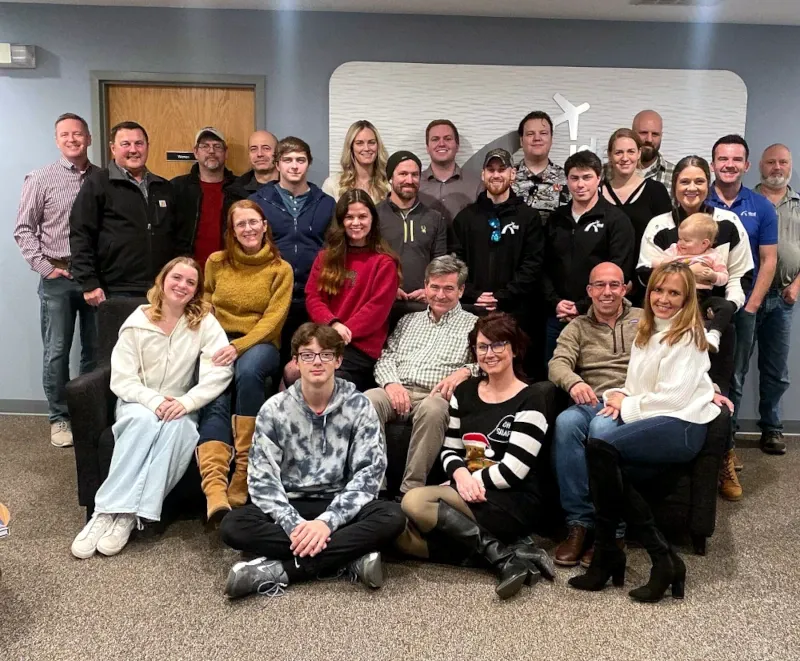 The team of Ideal Aviation in Sauget, IL, poses for a group photo