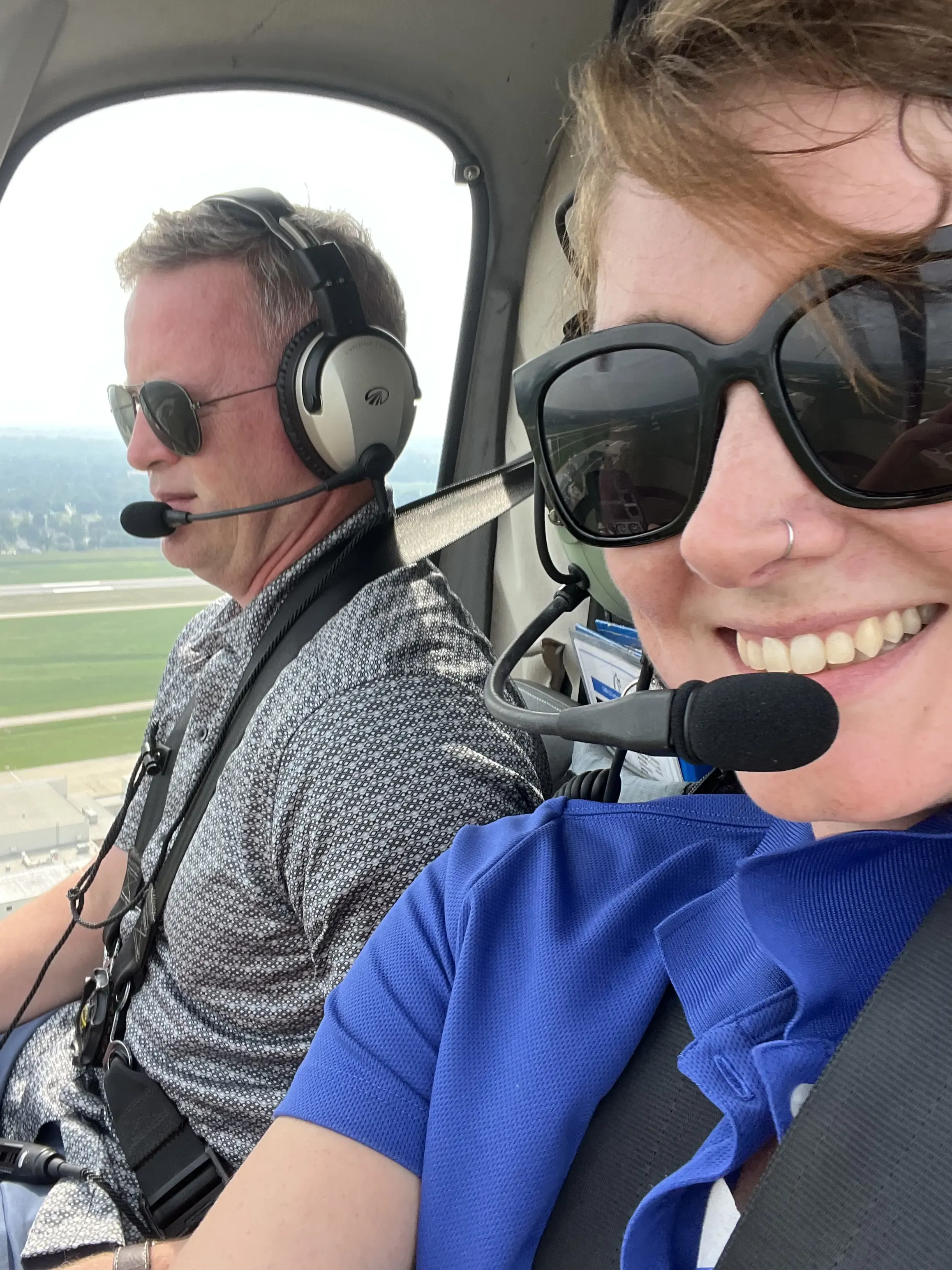 Pilot and co-pilot flying a helicopter over St. Louis, Missouri