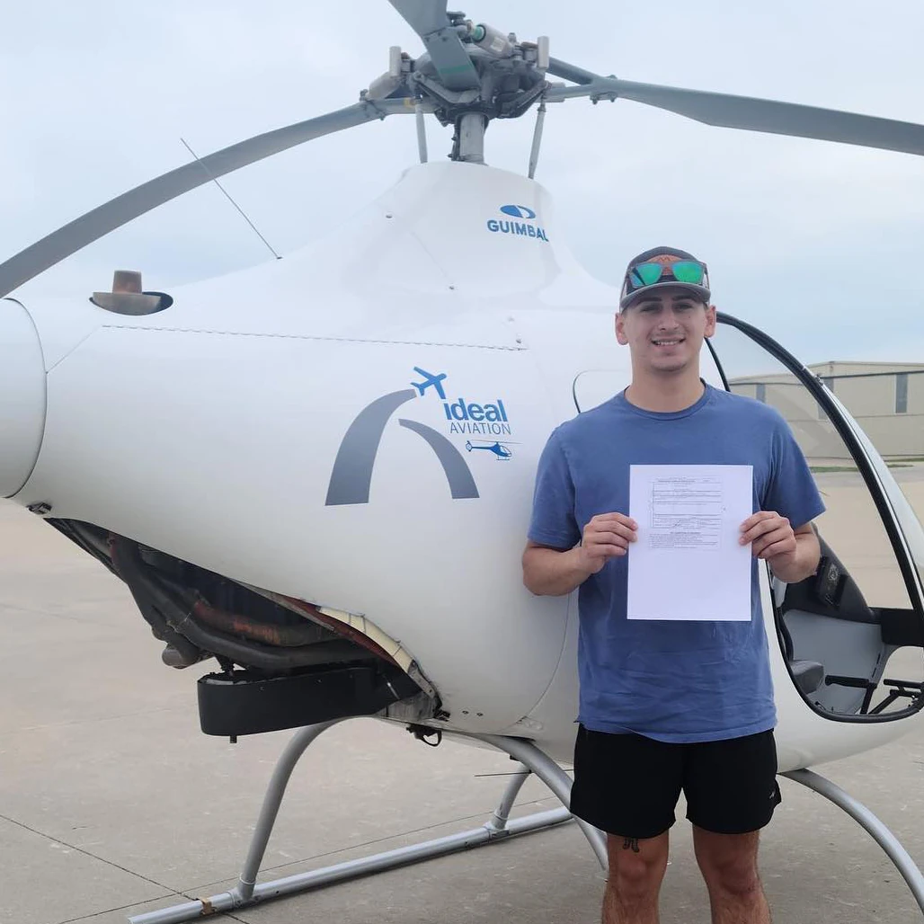 Student passing helicopter checkride