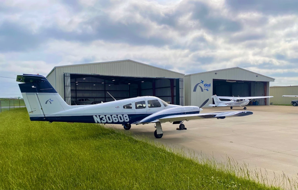 Piper Seminole and Cessna 172 parked outside the Ideal Aviation hangar at St. Louis Downtown Airport